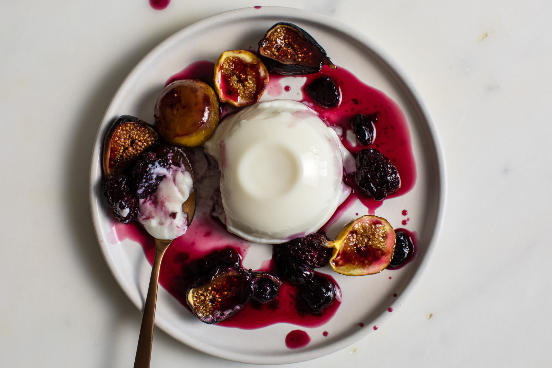 Panna cotta with figs and berries, in New York, Aug. 29, 2020. (Andrew Scrivani/The New York Times)